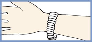 4. Close the bracelet clasp with your free hand. Remove the Bracelet Butler®.